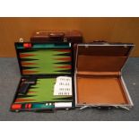 Three vintage briefcases and a cased backgammon set (4)