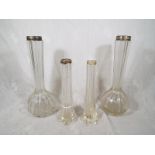 A pair of George V silver rimmed glass vases, 21cm (h),