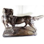 A large bronze sculpture depicting a gundog carrying a pheasant mounted on an Italian marble base,