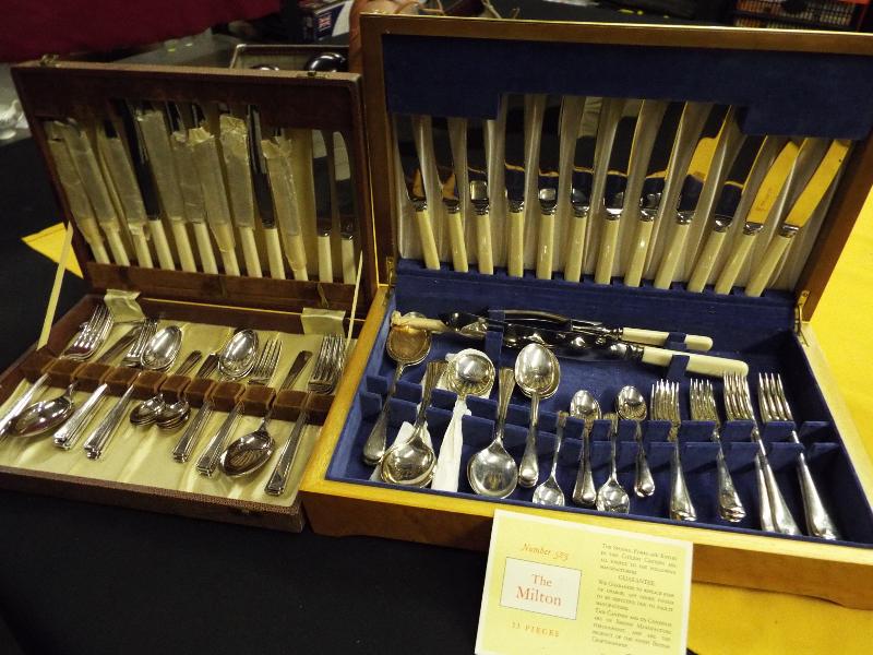 Two good quality canteens of cutlery to include The Milton comprising 53 peices (2)