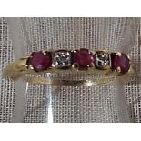 A lady's 9ct gold ruby and diamond eternity ring, size M 1/2, approximate weight 1.