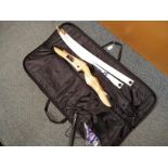 A Mac Accessories bag containing a SF Archery bow,