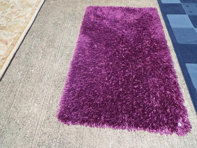 Two rugs, one with blue check, approx size 170cm x 230cm and another purple, - Image 3 of 3