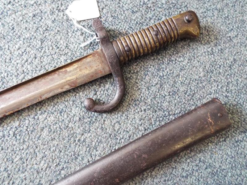 A 19th century French curved sword bayonet with brass handle and metal scabbard, - Image 2 of 4
