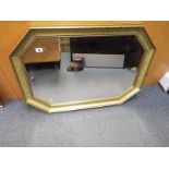 An octagonal bevel edged wall mirror,