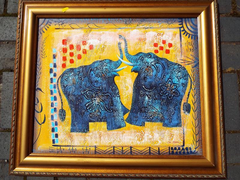 An oil on canvas depicting two Indian elephants signed (unclear) image size 50cm x 60cm,