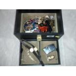 A box of costume jewellery to include wristwatches,