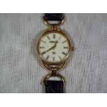 A lady's wristwatch, the dial marked Gucci with Roman Numerals,