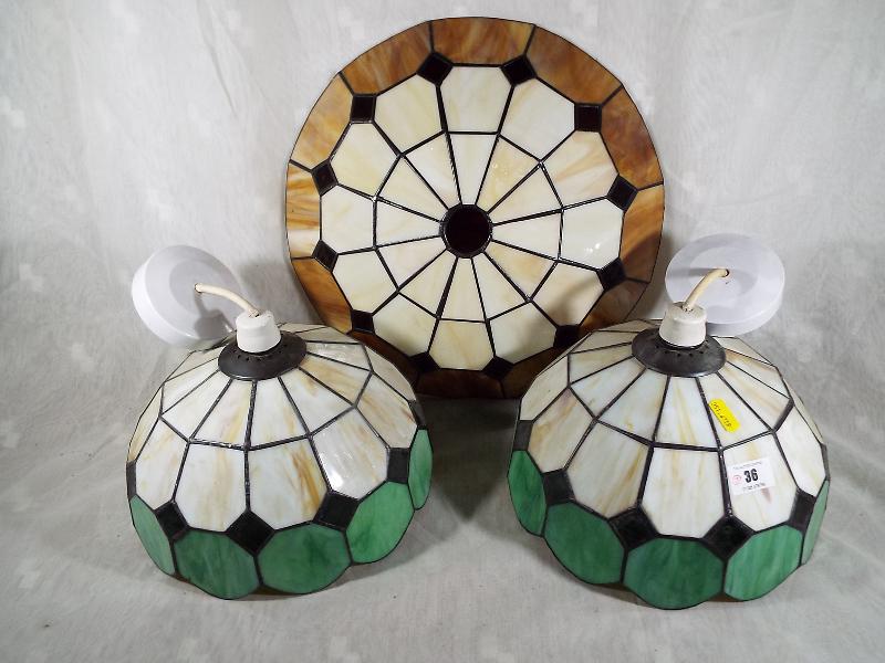 Three Tiffany style ceiling lamps