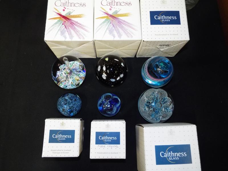 Six Caithness paperweights to include Crystal Carousel, Whirlpool, Helter Skelter, Moon Flower,