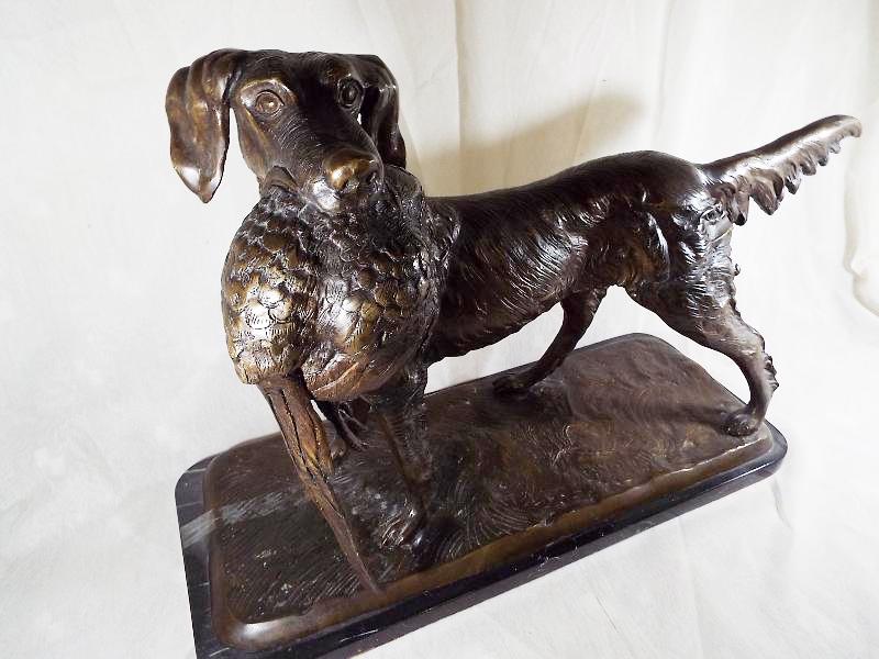 A large bronze sculpture depicting a gundog carrying a pheasant mounted on an Italian marble base, - Image 2 of 2
