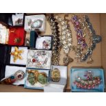 A good collection of costume jewellery to include an Exquisite brooch,