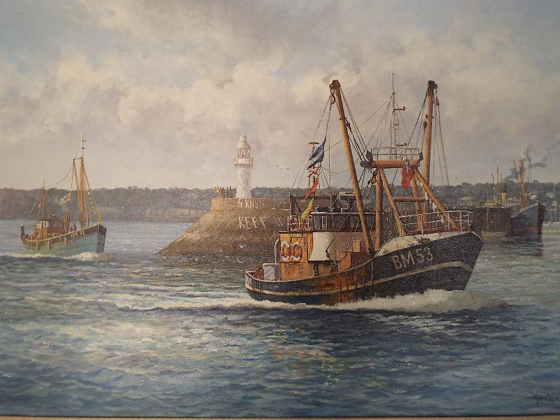 An oil on canvas depicting a headland scene with fishing boat,