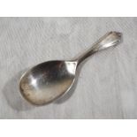 A silver hallmarked tea caddy spoon, Birmingham assay 1973, 9.