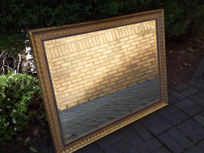 A good quality large bevel edged gilt framed wall mirror,
