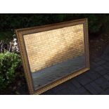 A good quality large bevel edged gilt framed wall mirror,