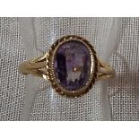 A lady's 9ct gold amethyst solitaire ring, size L 1/2, approximate weight 1.