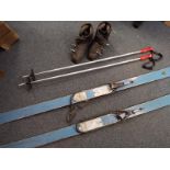 A pair of skis marked Tempo Start with poles and ski boots (qty) - Est £80 - £120