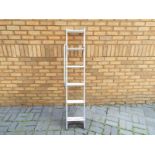 An extendable loft ladder approx height 3.