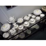 A Wedgwood six place setting dinner service decorated in the Westbury pattern,