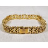 A lady's Rotary yellow metal bracelet,