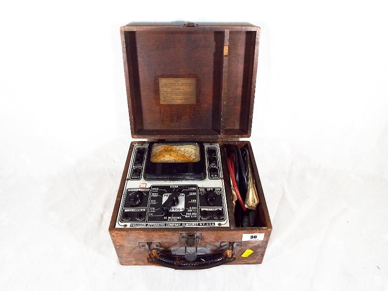 A Precision Series 856-G Ampmeter, in original wooden case,