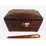 A 19th century sarcophagus oak tea caddy on bun feet,