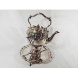 A silver plated teapot with warmer on stand,