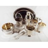 A quantity of good quality drinks related plated ware to include salver, cocktail shaker,