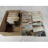 A box containing in excess of 500 early to mid period UK topographical postcards to include real