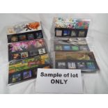A collection of mint Royal Mail stamps entitled Royal Mail Millennium stamps and similar Est £30 -