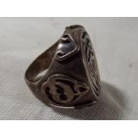 An unusual Eastern silver ring,