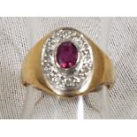 A lady's hallmarked 9ct yellow gold ruby and diamond dress ring with twelve 8 cut diamonds,