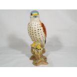 A Beswick pottery figurine depicting a Kestrel, finished in gloss, 16.