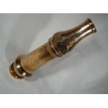 Fire Service - a heavy brass nozzle from a vintage fire hose, stamped GR wth crown above,