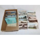 Approximately 300 early 20th century and later UK and foreign postcards to include photographs,