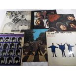 The Beatles - six vinyl reciord albums comprising Revolver, Rubber Soul, Help, A Hard Days Night,