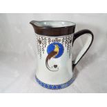 A Royal Doulton jug decorated in the Titanian pattern,