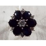 A lady's 18ct white gold 1970's sapphire and diamond cocktail ring, approx weight 6.