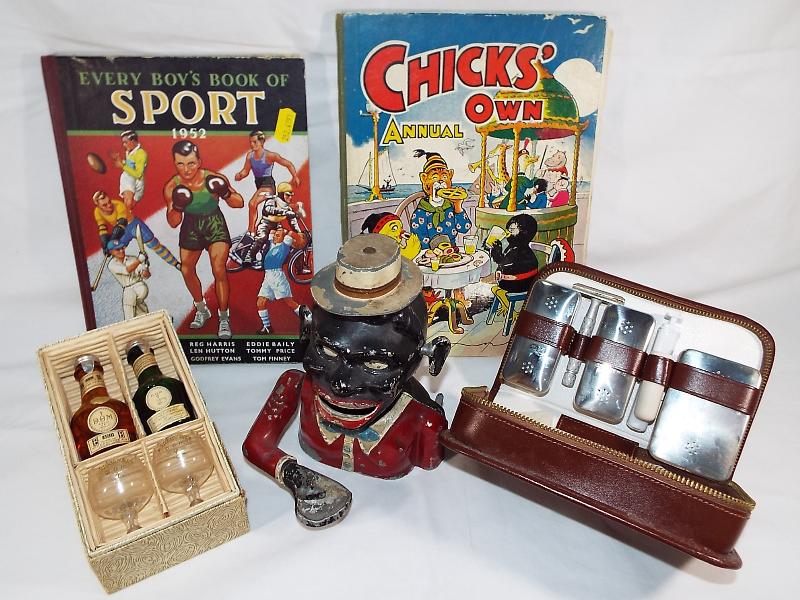 A small mixed lot of collectables comprising an original 'Jolly Nigger' money bank,