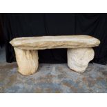 A reconstituted stone bench