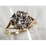 A lady's 9ct gold diamond cluster ring, size L1/2, approx weight 1.