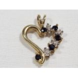 A 9ct gold heart shaped pendant set with sapphire diamond, approx weight 1.