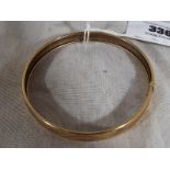 A lady's hallmarked 9ct gold bangle approx weight 6.