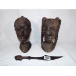 Two African wooden carved tribal heads and a wooden ceremonial knife (3)