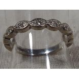 A lady's 18ct white gold half eternity ring set with seven 8 cut diamonds, approx weight 3.