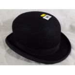 A Dunn & Co extra lightweight bowler hat,