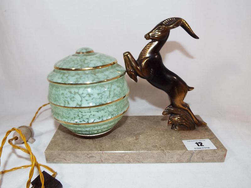 An Art Deco bronze spelter leaping deer desk lamp,