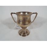 A George VI silver hallmarked twin handled trophy, Sheffield assay 1947, 11.