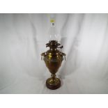 A Wright & Butler improved Duplex burner oil lamp,